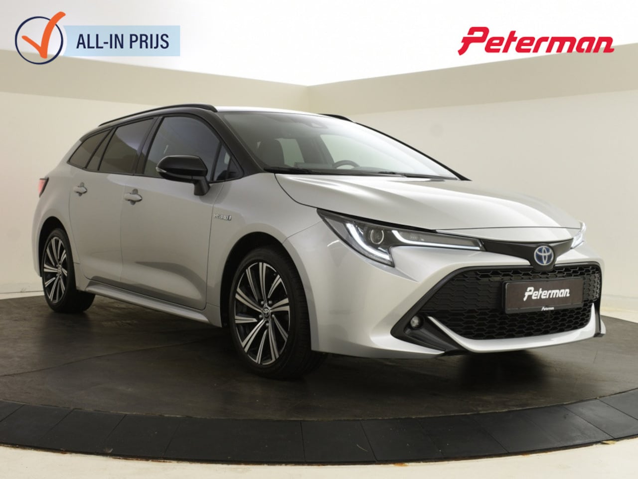 Toyota Corolla Touring Sports - 1.8 Hybrid Bi Tone | Stuur & Stoelverwarming | Head Up | Electr. - AutoWereld.nl