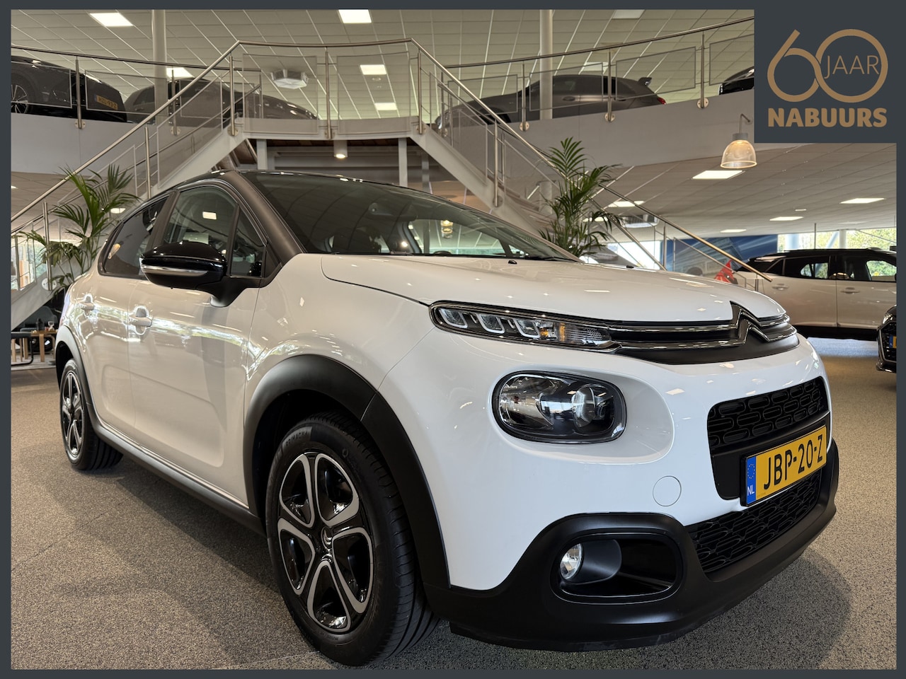 Citroën C3 - 1.2 82pk Feel, Navi, Clima, PDC, Cruise - AutoWereld.nl