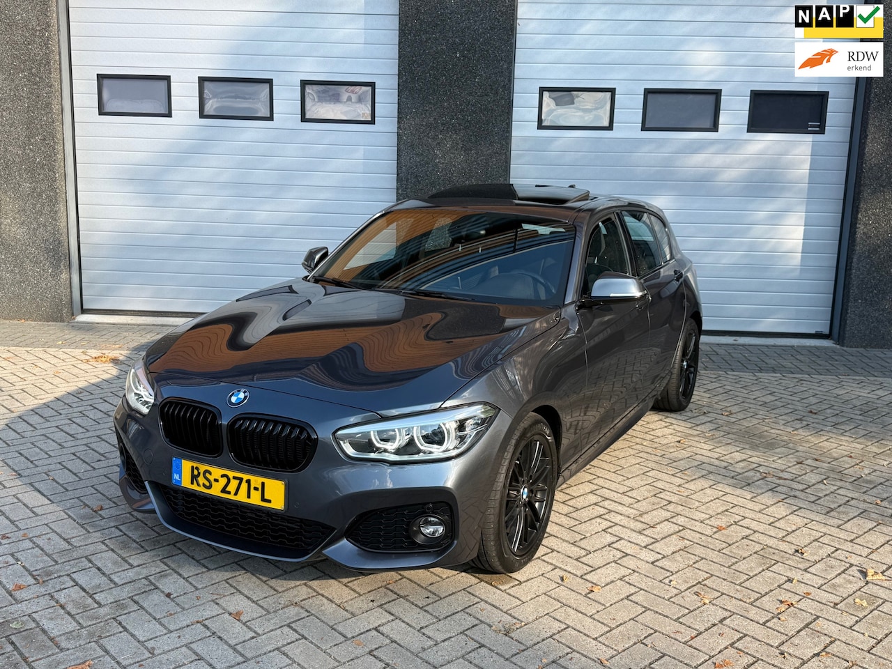 BMW 1-serie - 118i Edition M Sport Shadow High Executive DAK/AUT/NAP/CLIMA/PDC - AutoWereld.nl