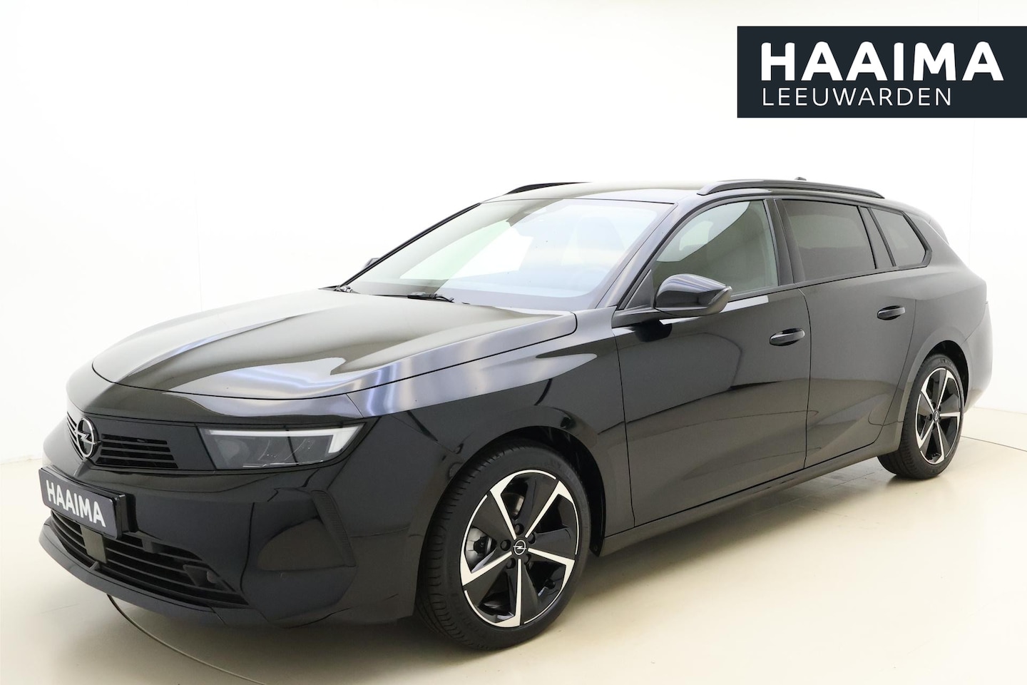 Opel Astra Sports Tourer - 1.2 Turbo Hybrid Business Edition | Navigatie | AUTOMAAT | 17'' lichtmetalen velgen | Stoe - AutoWereld.nl