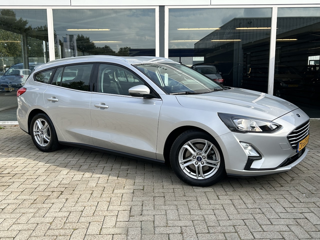 Ford Focus Wagon - 1.0 EcoBoost Trend Edition Business 50% deal 5.475,- ACTIE Trekhaak / LMV / PDC / Navi / C - AutoWereld.nl