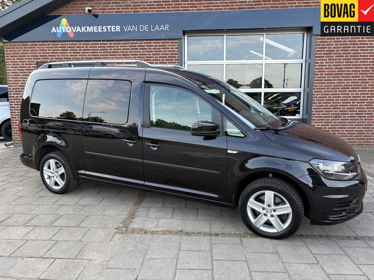 Volkswagen Caddy Maxi - 1.4 TSI Trendline 92kw Life 7 pers. ( Campeertent, Trekhaak, Cruise control, Parkeersensor - AutoWereld.nl