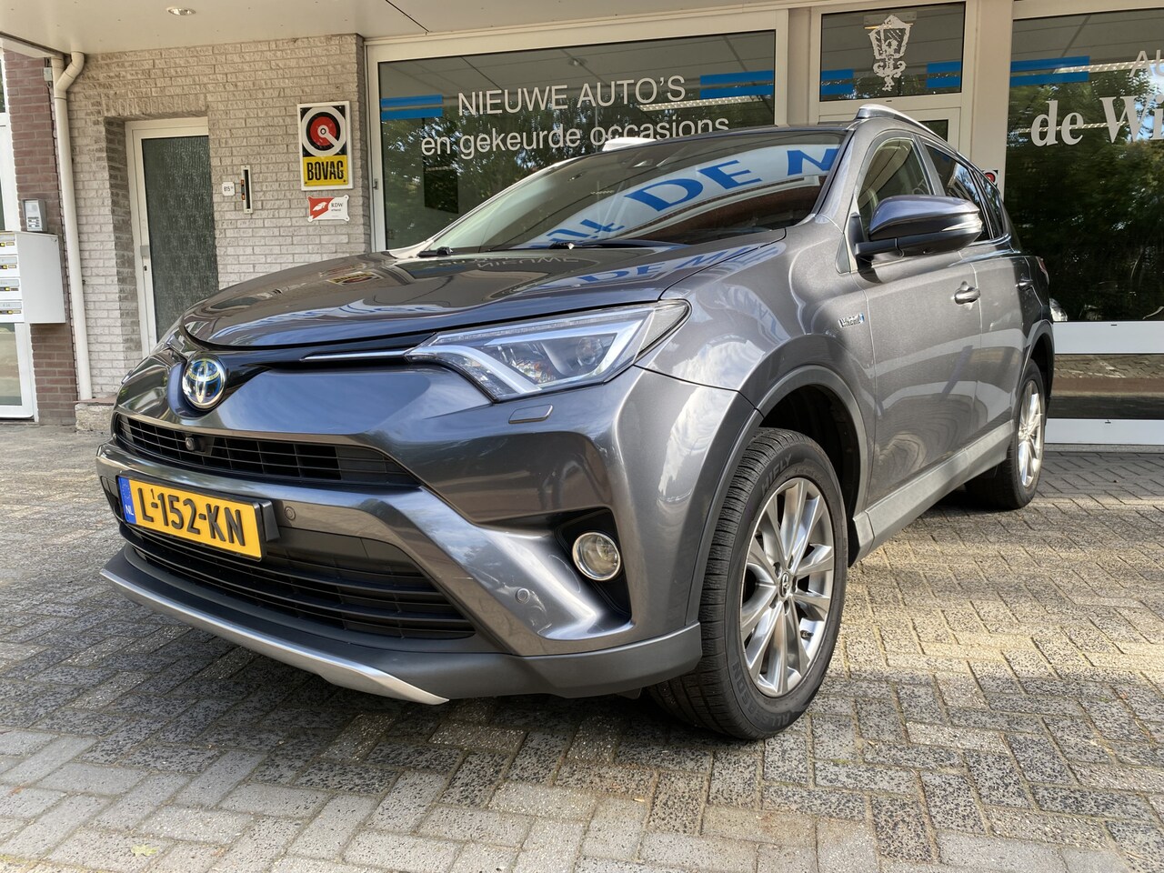 Toyota RAV4 - 2.5 Hybrid AWD Executive Navi Fullmap/Achteruitr.camera/Lederen bekl./Hoogteverstb. verwar - AutoWereld.nl