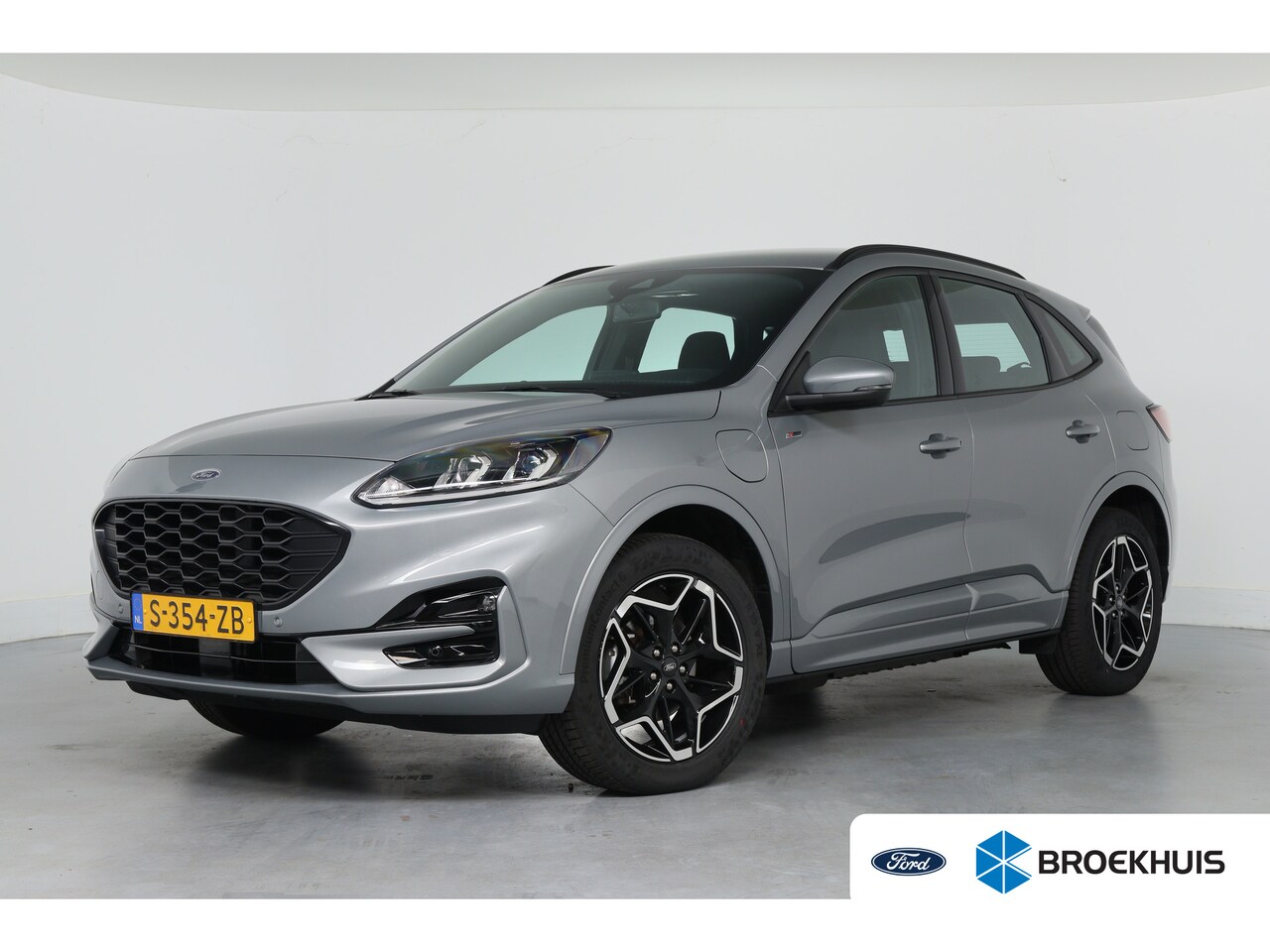 Ford Kuga - 2.5 PHEV ST-Line | Winter Pack | Navi | Camera | Clima | DAB | Keyless | Cruise | Parkeers - AutoWereld.nl