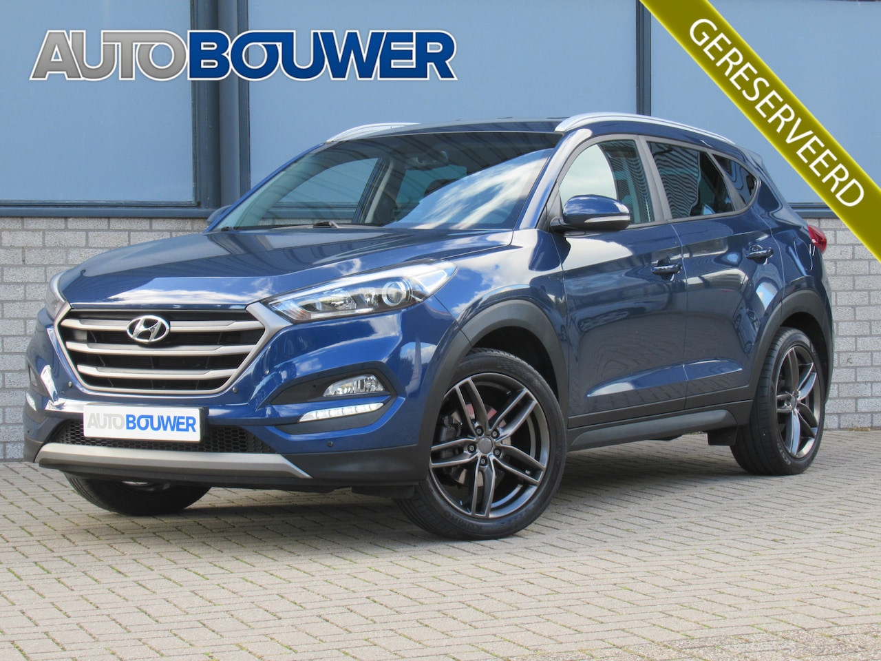 Hyundai Tucson - 1.6 GDi Comfort 2e eigen | dealer onderh | 19"inch | navi | camera | tr.haak - AutoWereld.nl