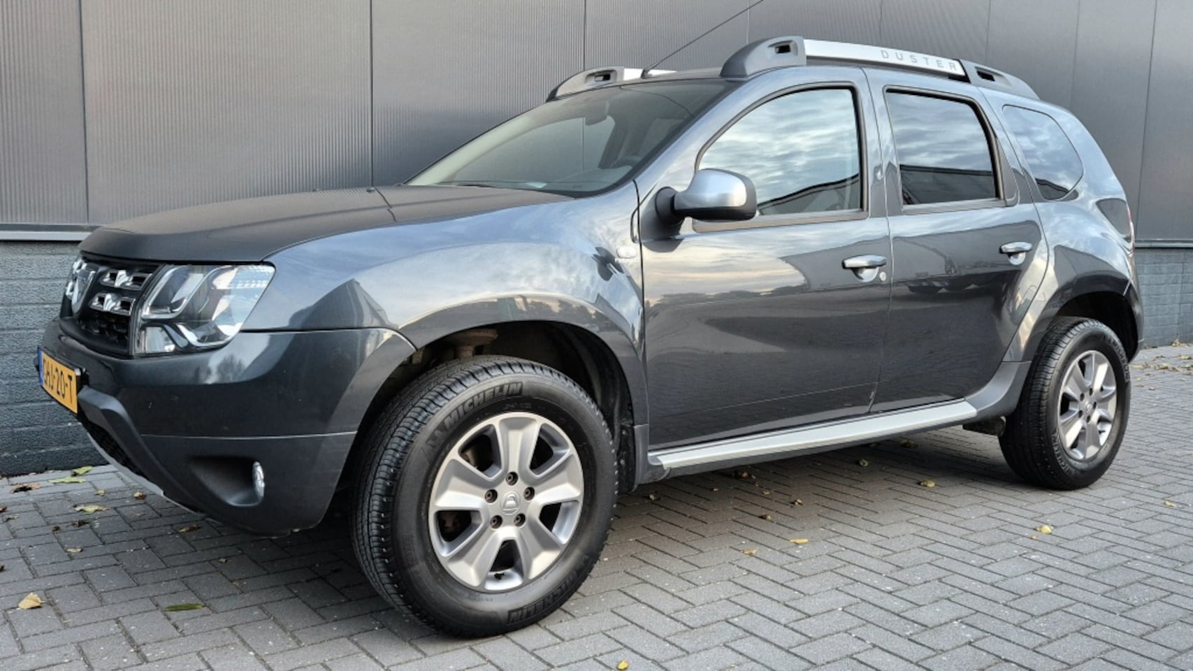 Dacia Duster - 1.5 dCi S&S | 4WD | Euro-6 | airco | cruise | navi | - AutoWereld.nl