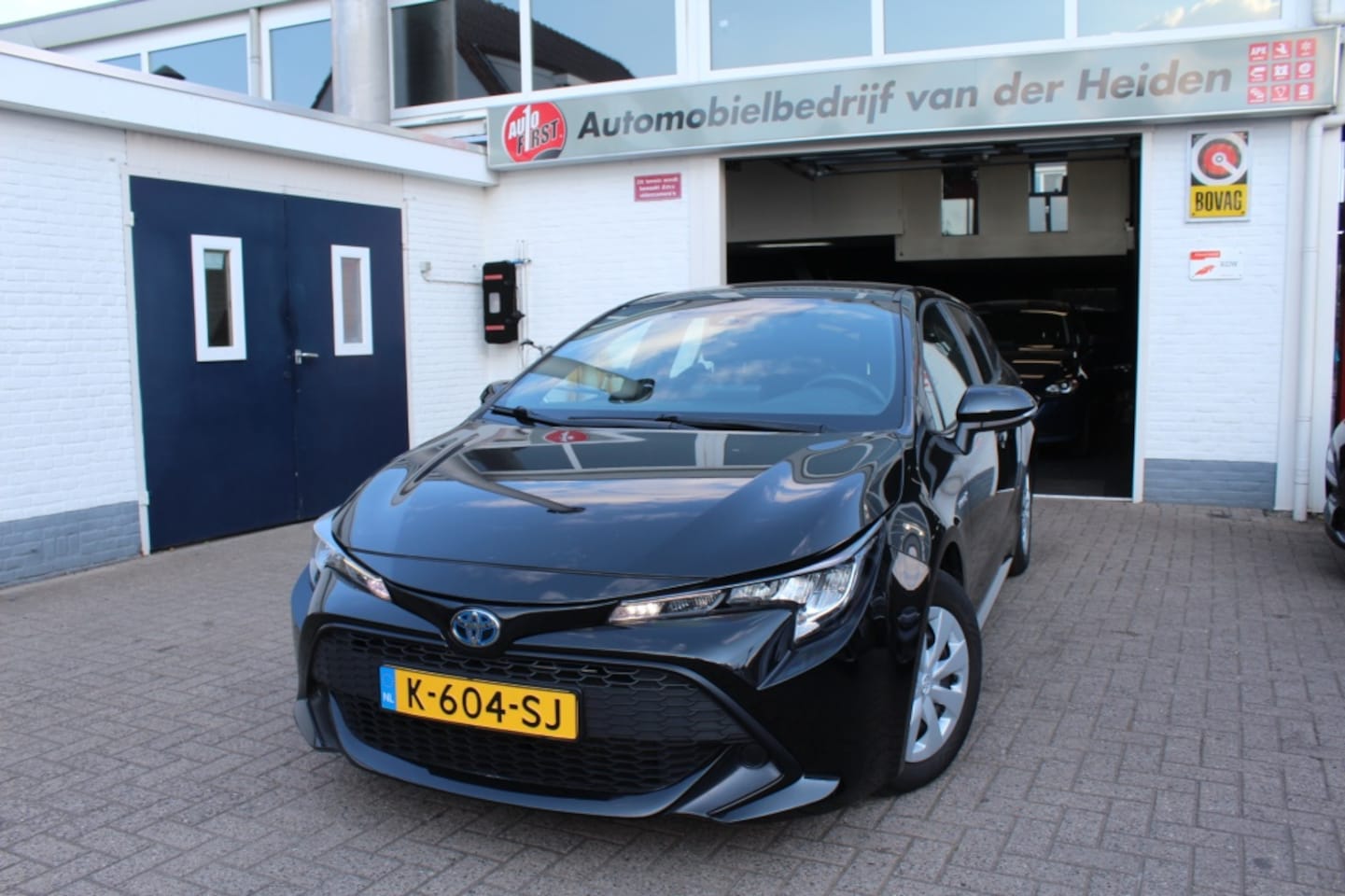 Toyota Corolla Touring Sports - 1.8 Hybrid Comfort Navi - AutoWereld.nl