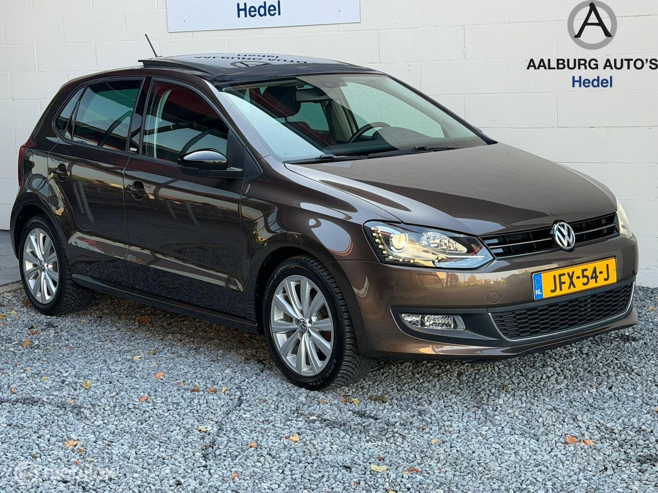 Volkswagen Polo - 1.4-16V Highline Pano Xenon Navi Cruise Clima - AutoWereld.nl
