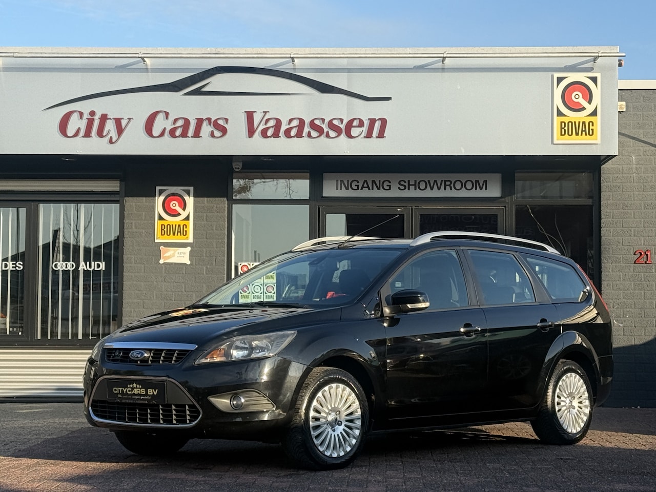 Ford Focus Wagon - 1.8 Titanium Flexi Fuel 126 pk navigatie climate ctr cruise ctr pdc achter lmv 16 inch tre - AutoWereld.nl