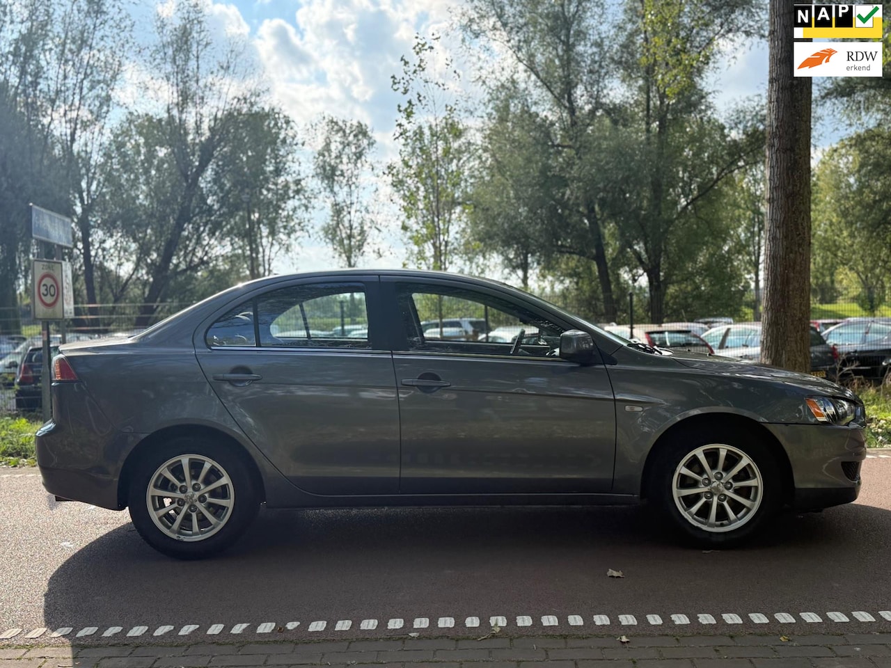 Mitsubishi Lancer Sports Sedan - 1.6 Edition One AIRCO!APK2026!KOOPJE! - AutoWereld.nl
