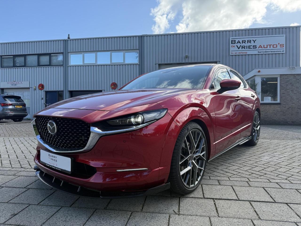 Mazda CX-30 - 2.0 e-SkyActiv-G M Hybrid Luxury | Bose | Head-up Display | Afneembare Trekhaak | Adaptief - AutoWereld.nl