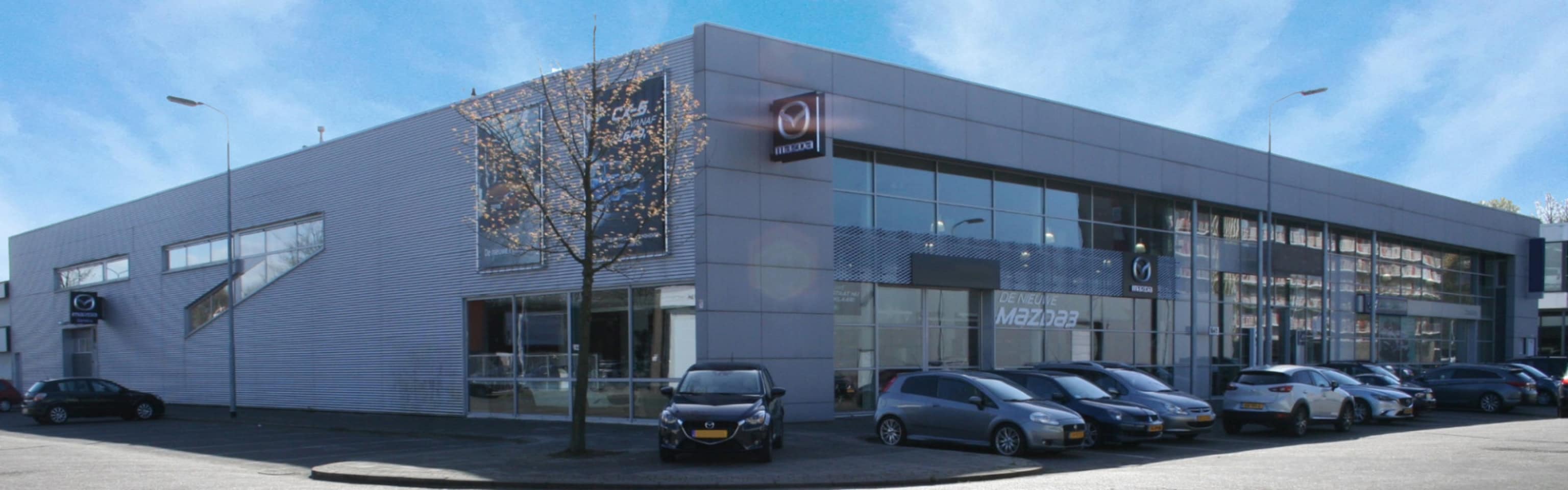 Mazda 3 - 1.6 Navigator / 58.000km!! - AutoWereld.nl