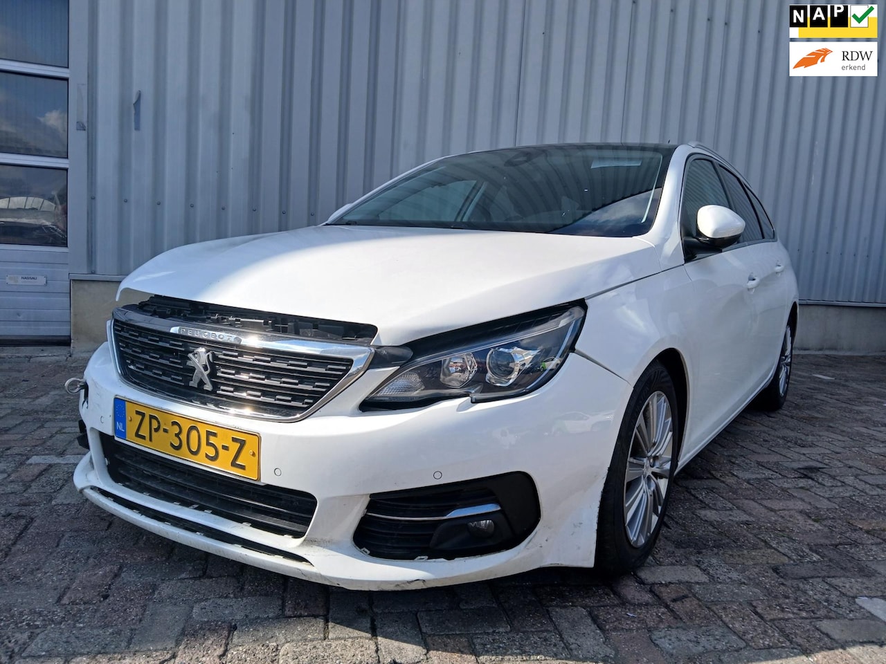 Peugeot 308 SW - 1.5 BlueHDi Blue Lease Premium SCHADEAUTO!!! - AutoWereld.nl