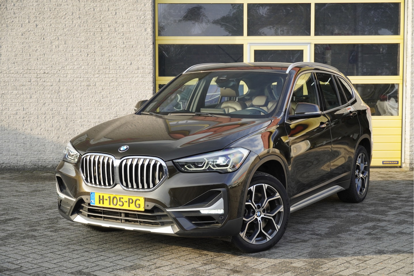 BMW X1 - sDrive20i 192PK! Automaat VDL Nedcar Edition Executive BJ2020 Lmv 18" | Led | Pdc | Navi | - AutoWereld.nl