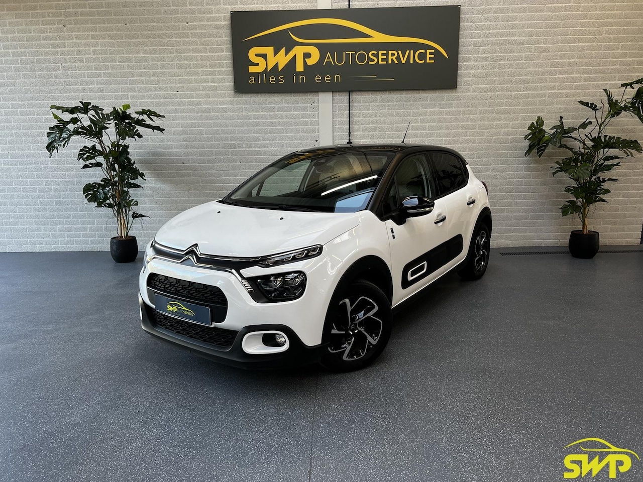 Citroën C3 - 1.2 PureTech Shine | Saint James edition | Navi | Cam - AutoWereld.nl