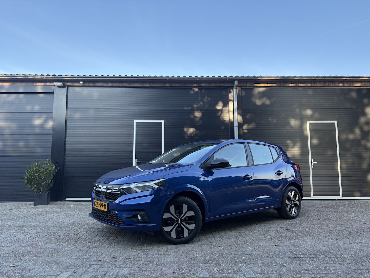 Dacia Sandero - 1.0 TCe 90 Journey | Trekhaak | NL-auto - AutoWereld.nl