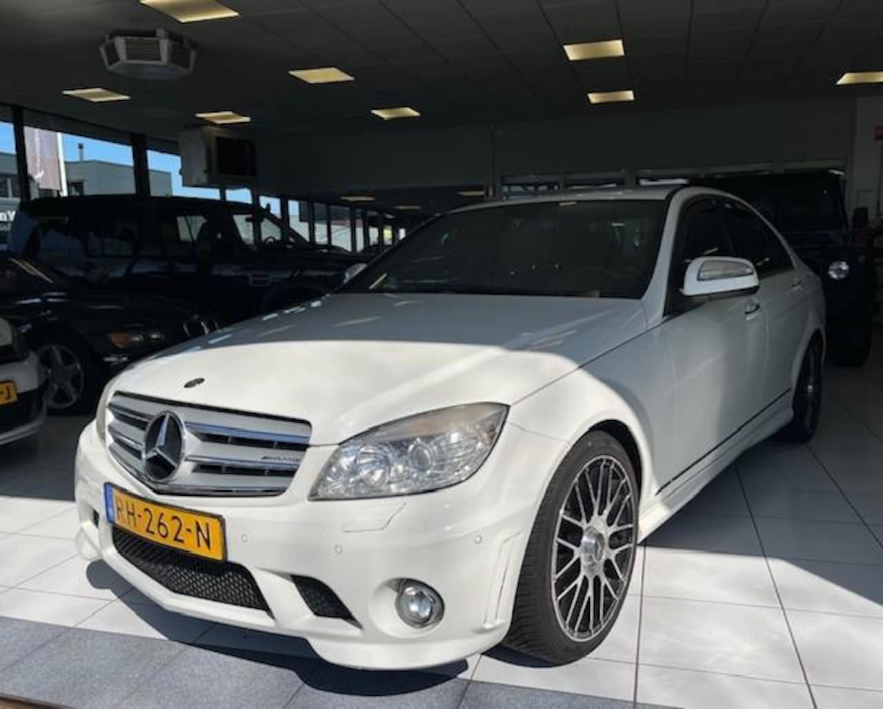 Mercedes-Benz C-klasse - 180 K Business Class Avantgarde/AMG pakket/Automaat/Navi/Stoelverwarming/Airco/Half Leder - AutoWereld.nl