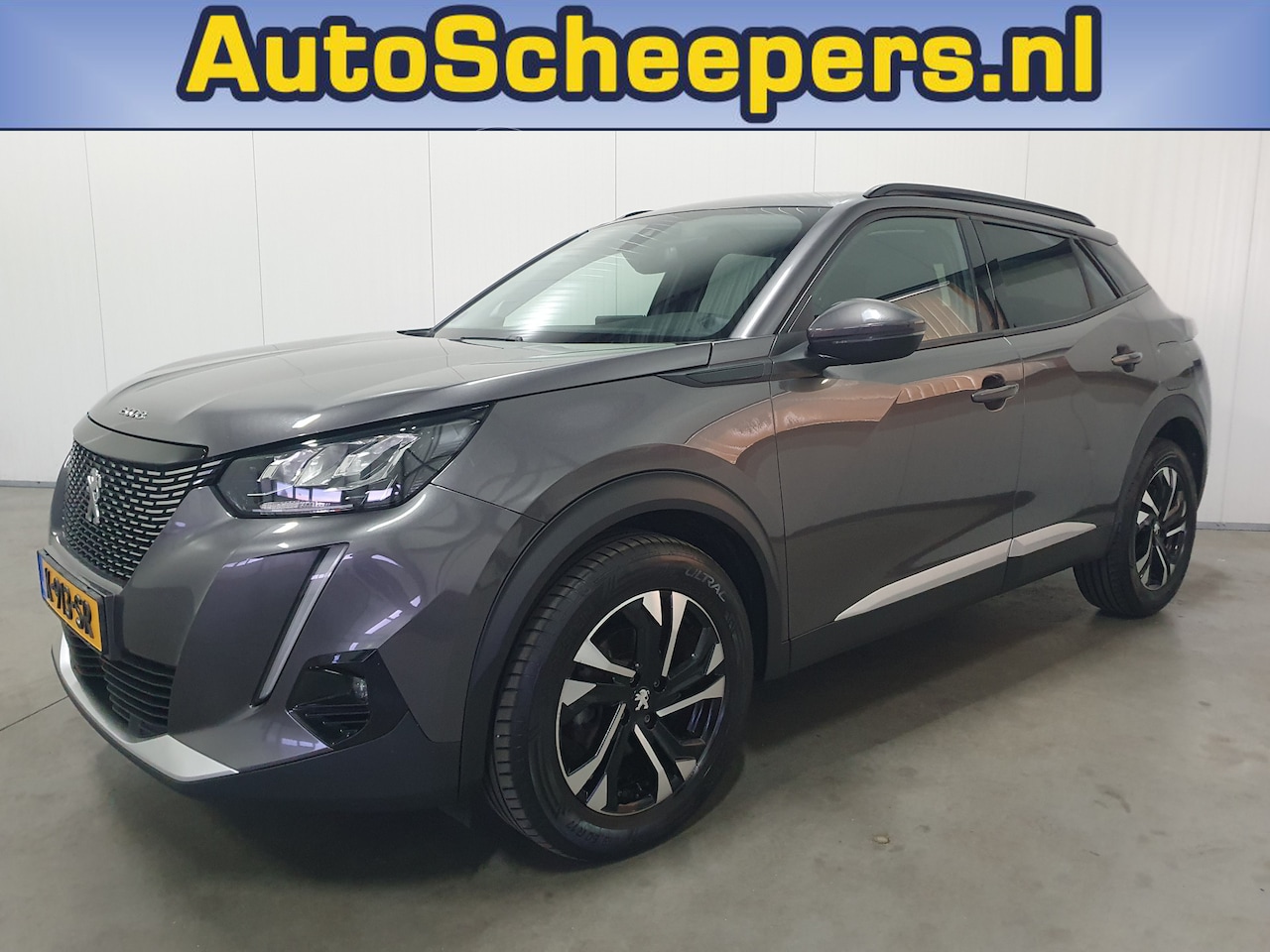 Peugeot 2008 - 1.2 PureTech Blue Lease Allure PDC/NAVI/CARPLAY/CLIMA/LMV - AutoWereld.nl