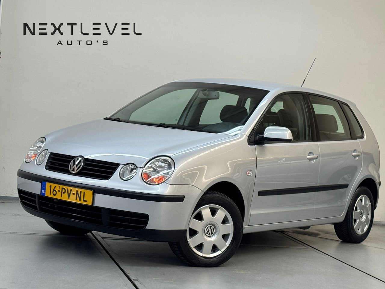 Volkswagen Polo - 1.4-16V Comfortline AUTOMAAT Airco Cruise Lage KM - AutoWereld.nl
