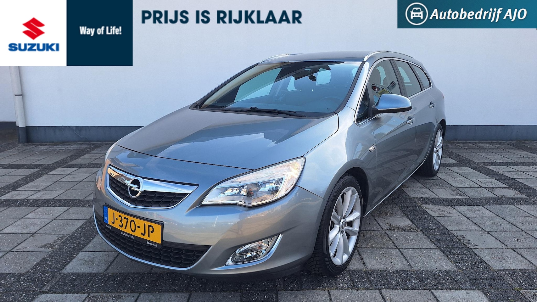 Opel Astra Sports Tourer - 1.4 Turbo Edition rijklaar prijs - AutoWereld.nl