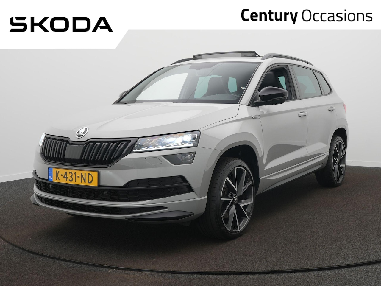Skoda Karoq - 1.5 TSI ACT Sportline Business Navigatie - 19 Inch - Panoramadak - Automaat - Leer - Trekh - AutoWereld.nl