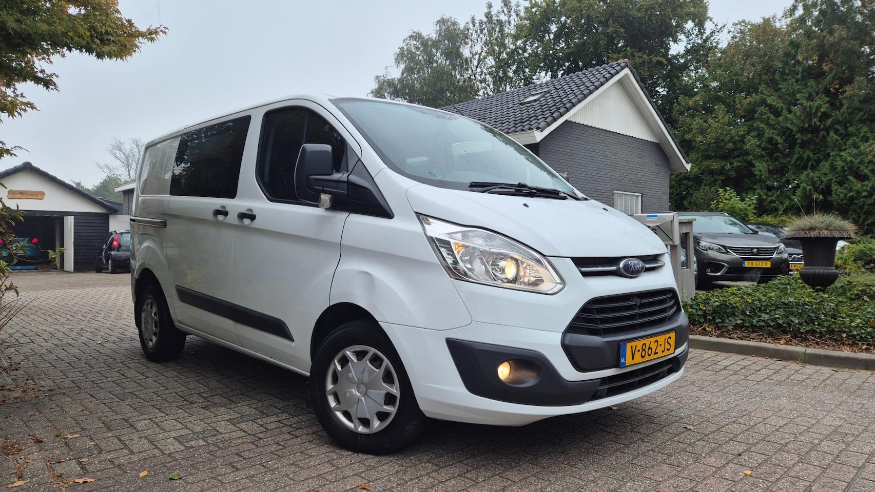 Ford Transit Custom - 270 2.0 TDCI L1H1 DC airco-euro6 2017 - AutoWereld.nl