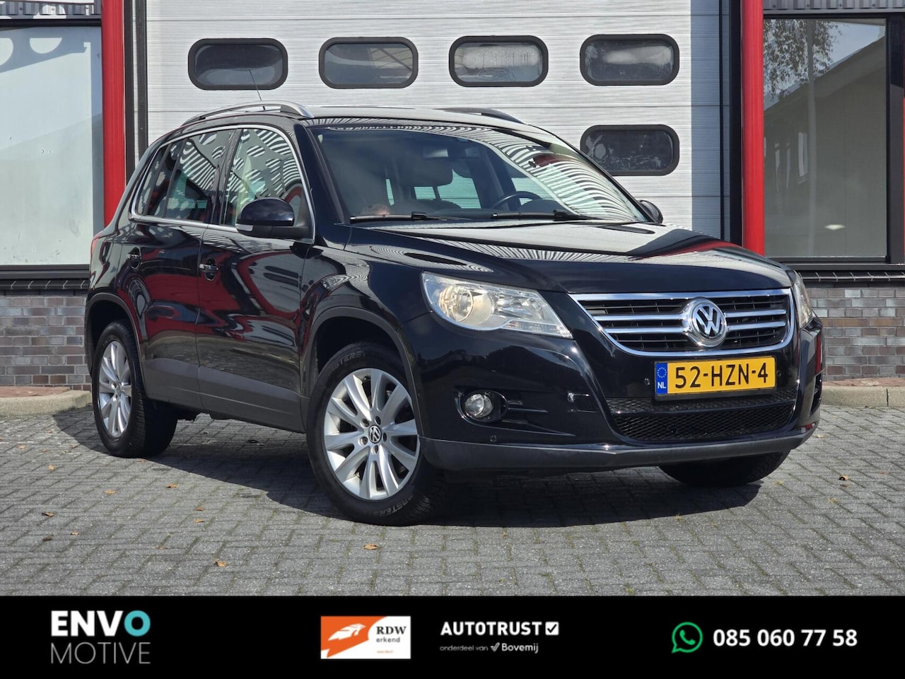 Volkswagen Tiguan - 1.4 TSI Sport&Style 4Motion Navi/Clima/PDC - AutoWereld.nl