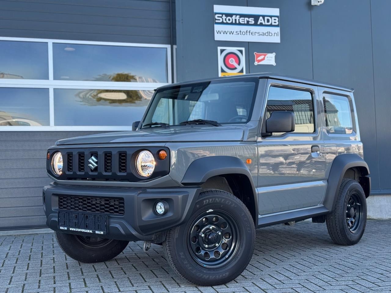 Suzuki Jimny - 1.5 AllGrip | BTW AUTO ! | GRIJS KENTEKEN | TREKHAAK | 2-ZITTER | AIRCO | CRUISE | BLUETOO - AutoWereld.nl
