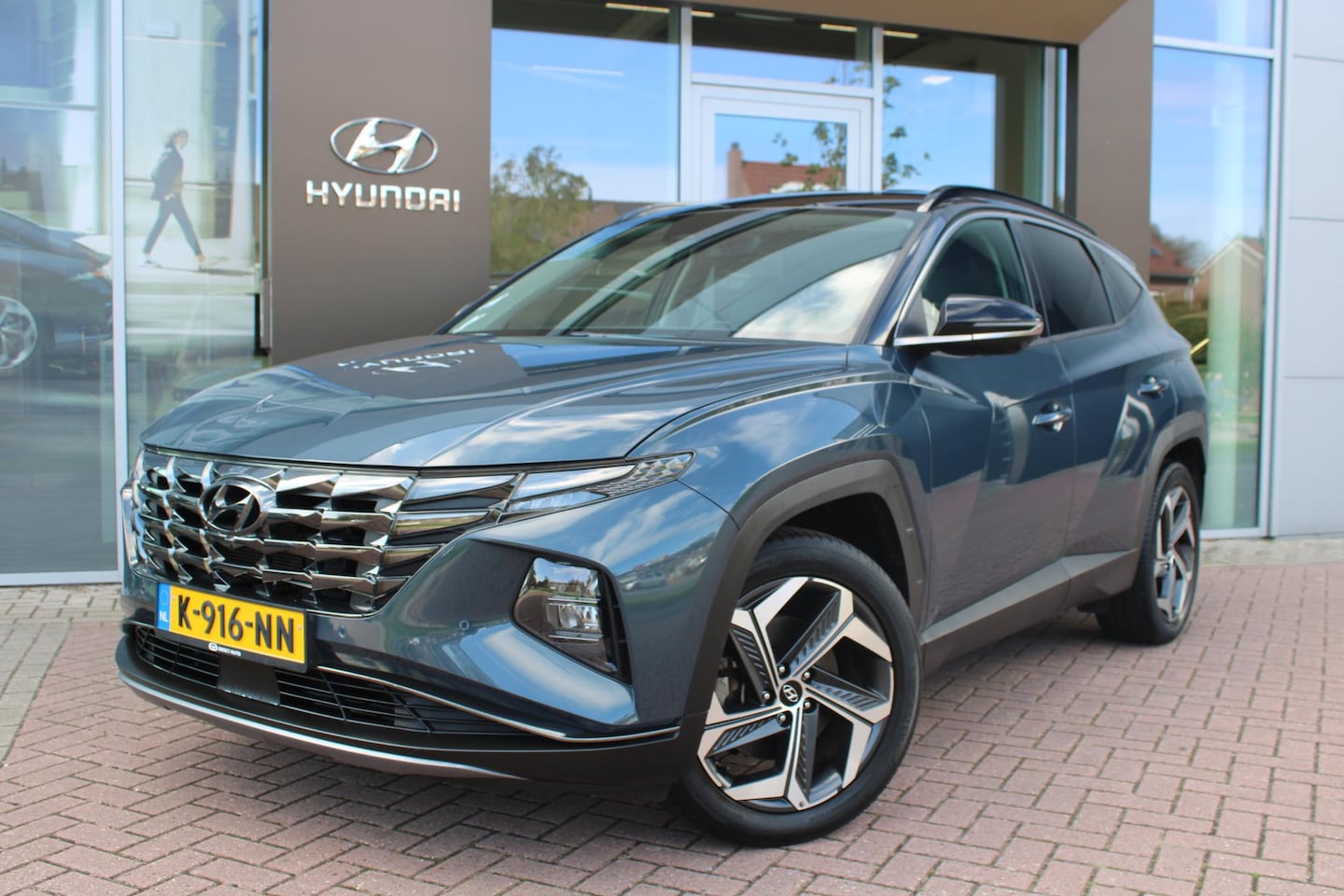 Hyundai Tucson - 1.6 T-GDI HEV Premium Leer Airco Navi Carplay Rondom camera's 1e eigenaar Stoelverwarming/ - AutoWereld.nl