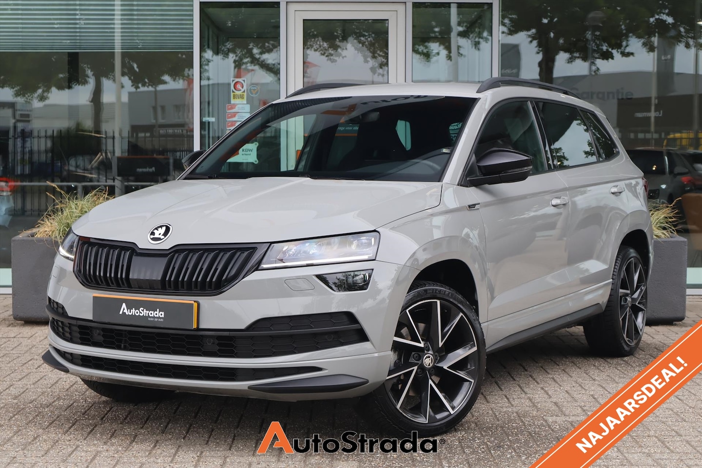 Skoda Karoq - 1.5 SportLine TSI ACT Greentech 150pk | Trekhaak | Virtual | Navi | Carplay | Camera | Cli - AutoWereld.nl