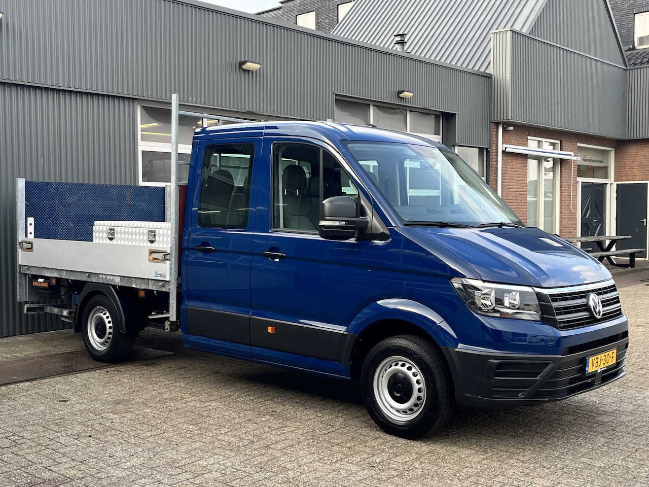 Volkswagen Crafter - 35 2.0 TDI DC Laadklep 750kg Openlaadbak Pick-up Airco Cruise controle 6-Persoons Telefoon - AutoWereld.nl