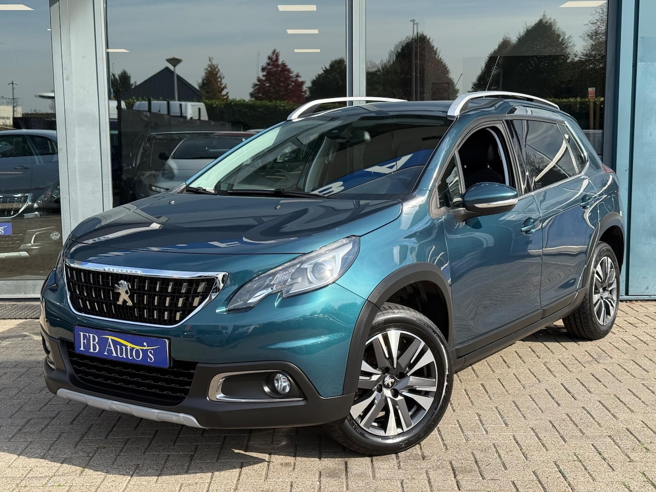 Peugeot 2008 - 1.2 PureTech Allure Airco Lmv Navi Cruise Camera - AutoWereld.nl