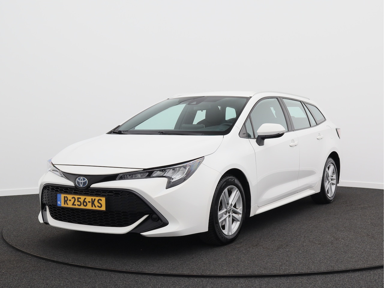 Toyota Corolla Touring Sports - 1.8 Hybrid Active/ lage km/ zeer mooi! - AutoWereld.nl