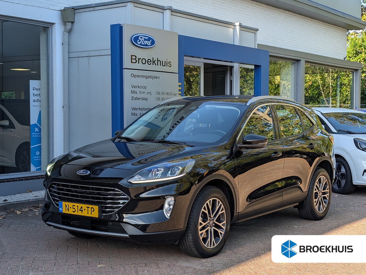 Ford Kuga - 2.5 PHEV Titanium 225pk | Keyless | Navi | Carplay | Camera | Climate | 1e Eigenaar & Deal - AutoWereld.nl