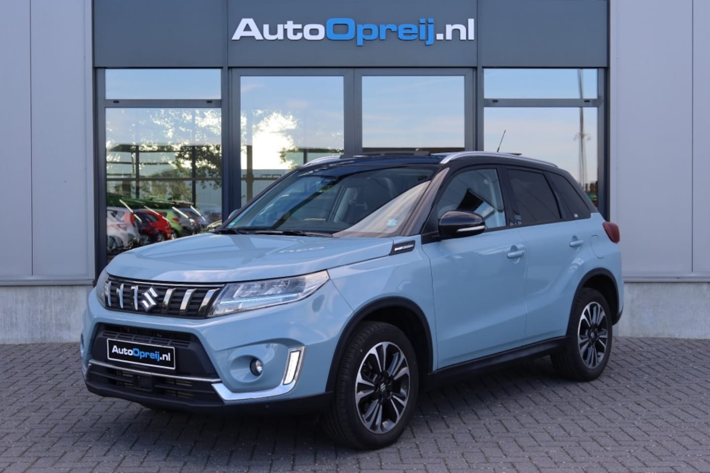 Suzuki Vitara - 1.4 Boosterjet  Hybrid Stijle AUTOMAAT AllGrip Schuif/kanteldak, Leder, NAVI, Camera - AutoWereld.nl
