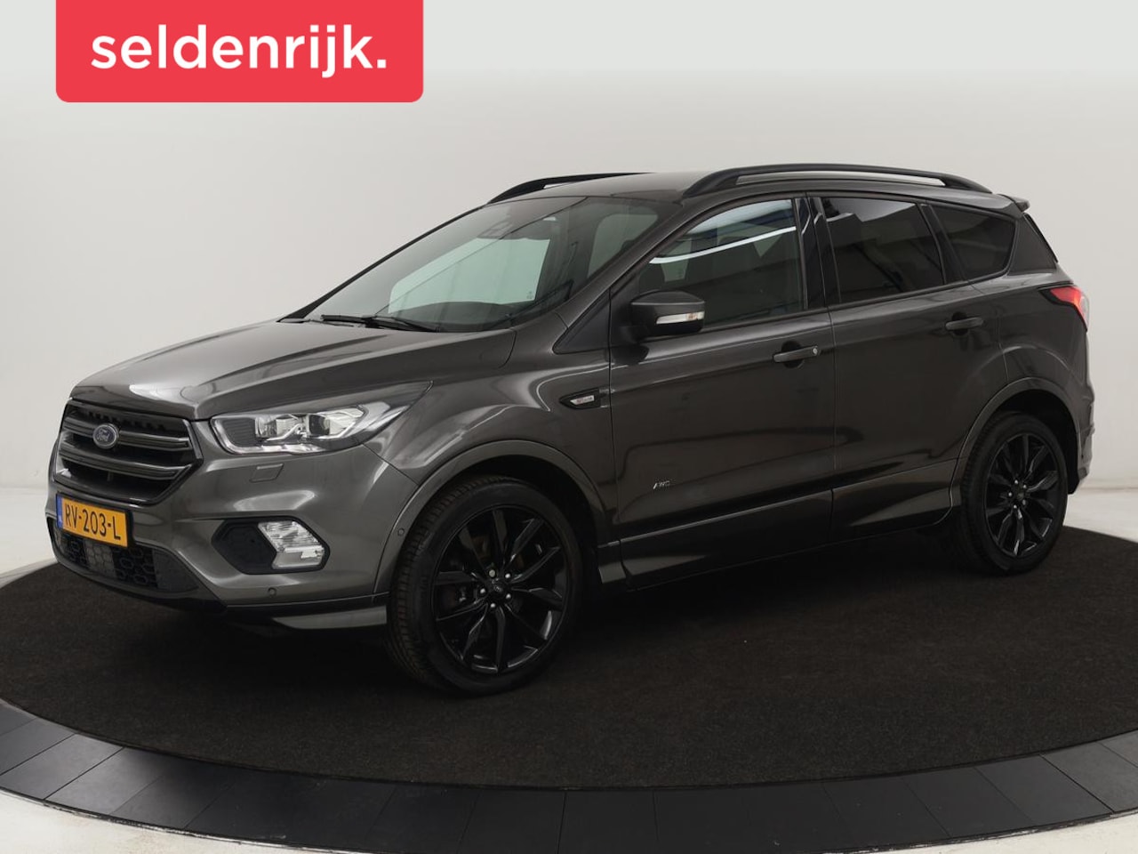 Ford Kuga - 1.5 EcoBoost ST Line | Stoelverwarming | Half leder | Carplay | Camera | Park Assist | Nav - AutoWereld.nl