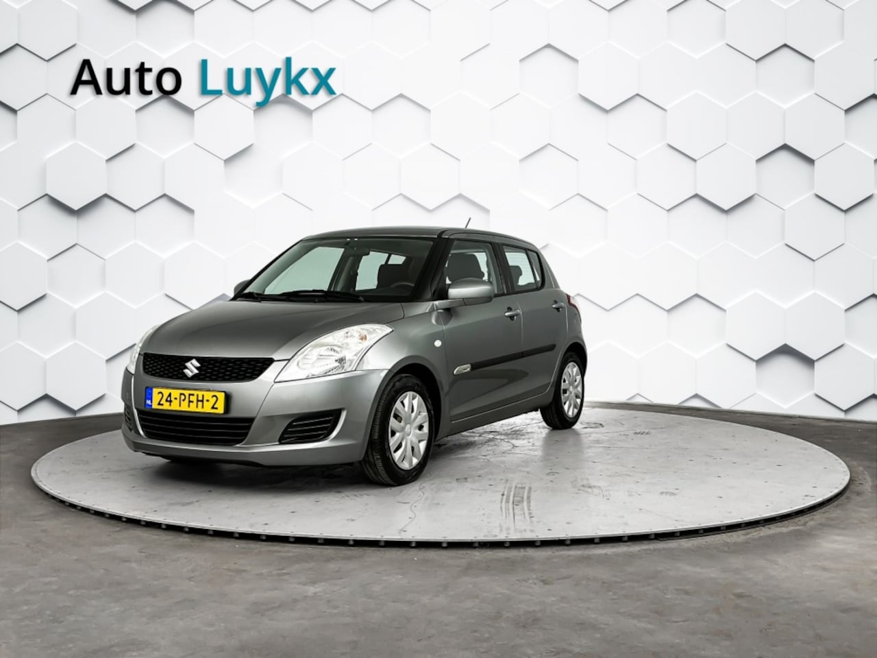 Suzuki Swift - 1.2 Comfort EASSS | Airco | Stoelverwarming | 5-Deurs - AutoWereld.nl