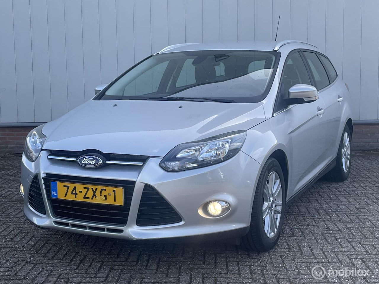 Ford Focus Wagon - 1.0 EcoBoost Titanium | 1e eigenaar | Dealeronderhouden | Navigatie | PDC | LMV | - AutoWereld.nl