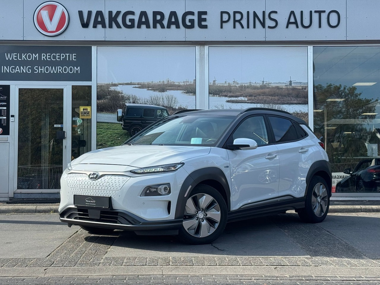 Hyundai Kona Electric - EV Premium 64 kWh |LEDER|HEAD-UP|LEDER|NAVI|STOELVW|ADAPTIVE|BTW| - AutoWereld.nl