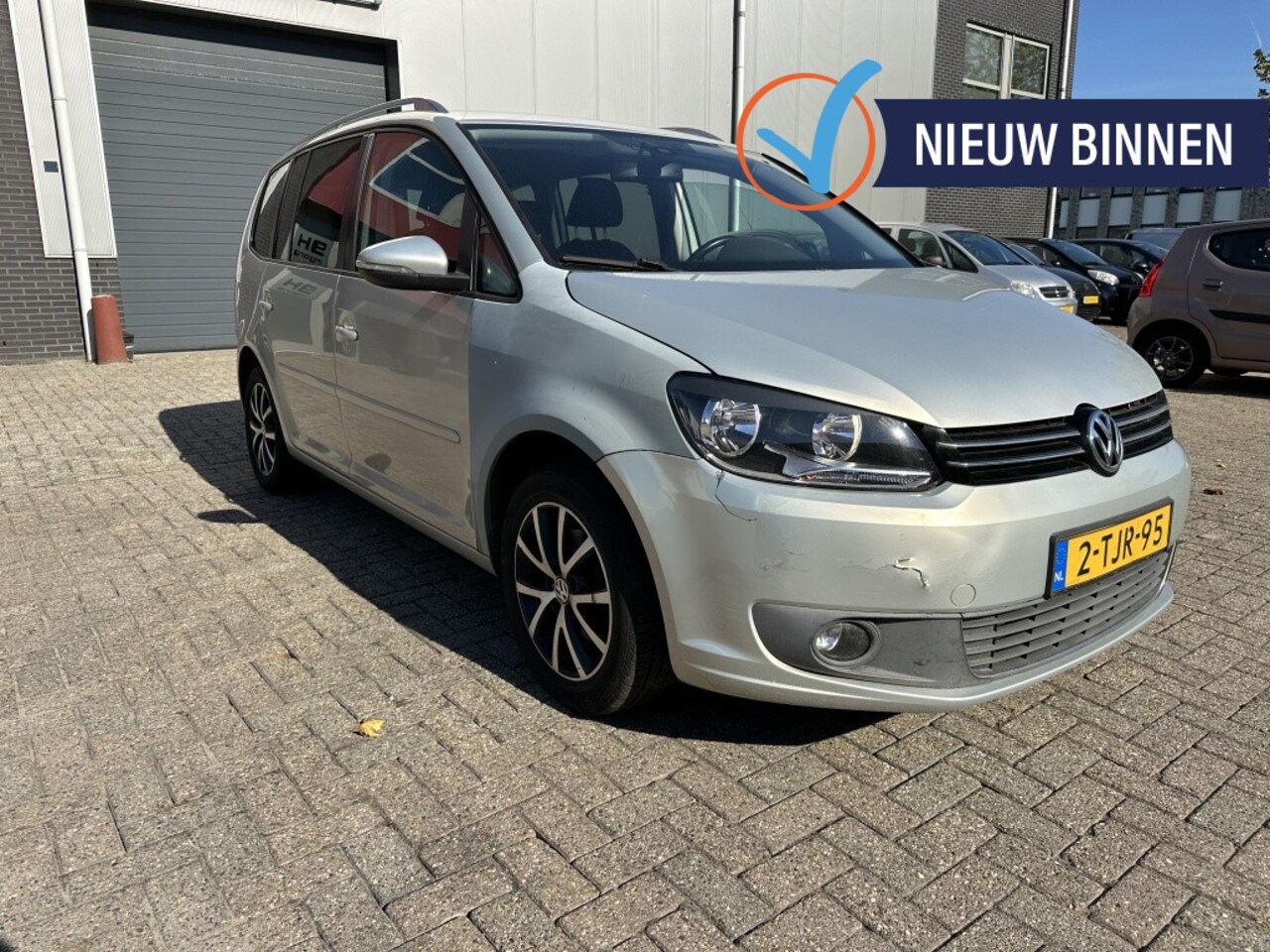 Volkswagen Touran - 1.6 TDI Highline VOL OPTIES LICHTE SCHADE! - AutoWereld.nl