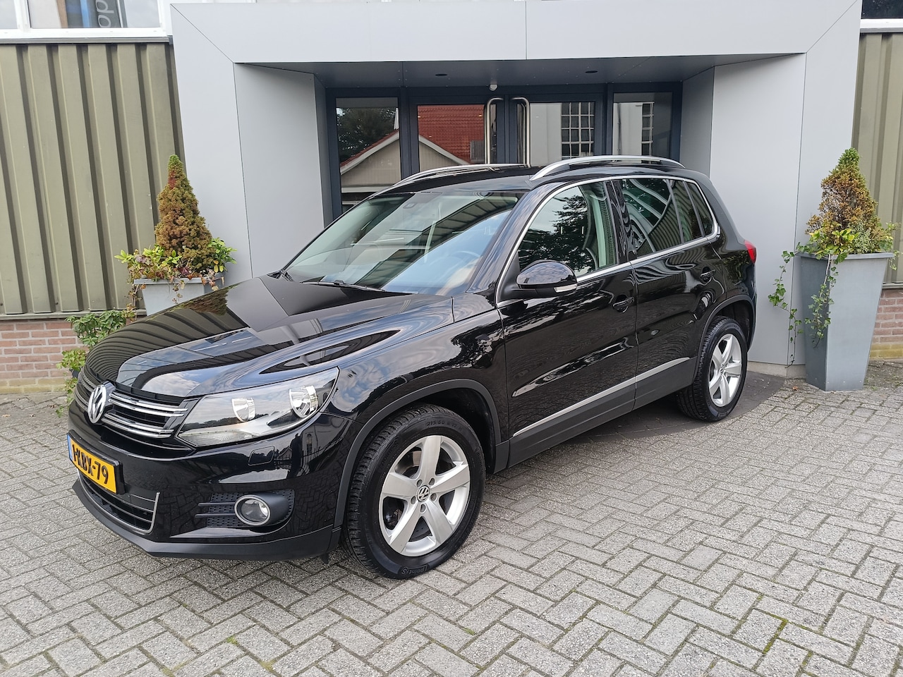 Volkswagen Tiguan - 1.4 TSI Comfort&Design | Airco | Trekhaak | Stoelverwarming | - AutoWereld.nl