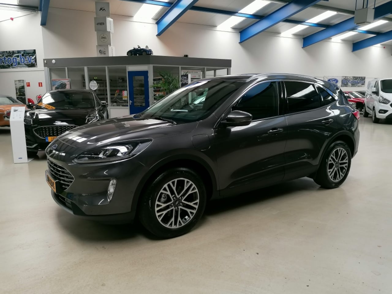 Ford Kuga - 2.5 PHEV Titanium X 2.5 PHEV Titanium X (trekhaak) - AutoWereld.nl