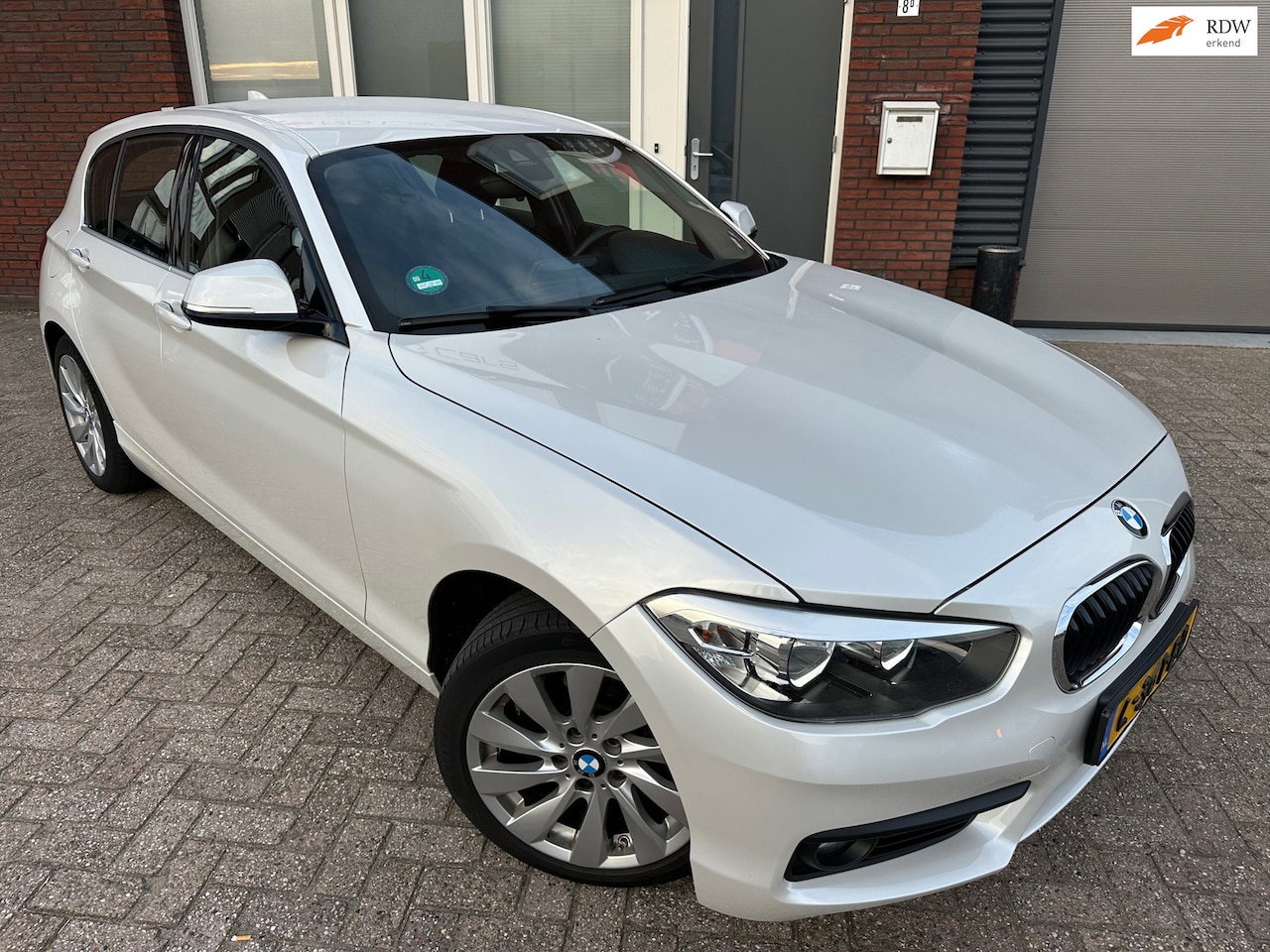 BMW 1-serie - 116i Sport / Navi / PDC / Clima / Cruise - AutoWereld.nl
