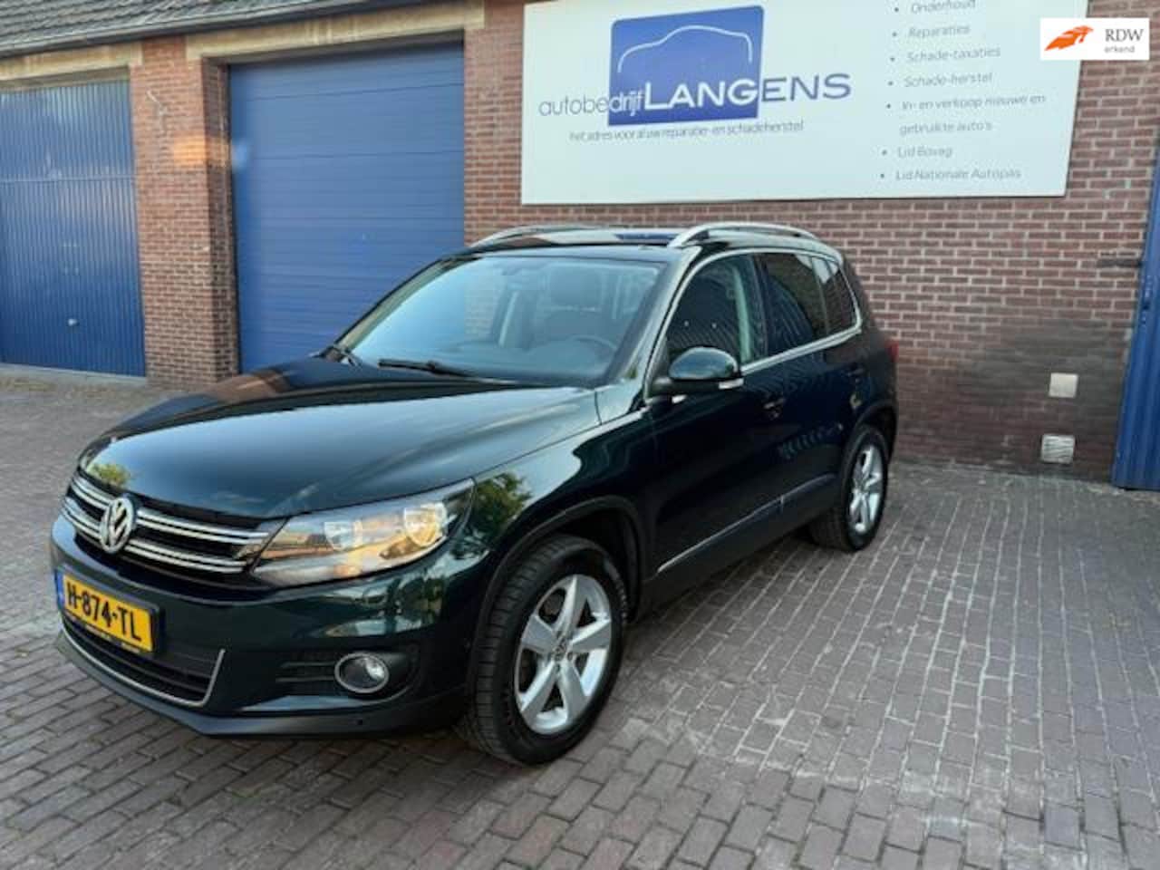 Volkswagen Tiguan - 2.0 TSI Sport&Style 4Motion AUT., Navi, PDC V+A Stoelverw., Clima enz. - AutoWereld.nl
