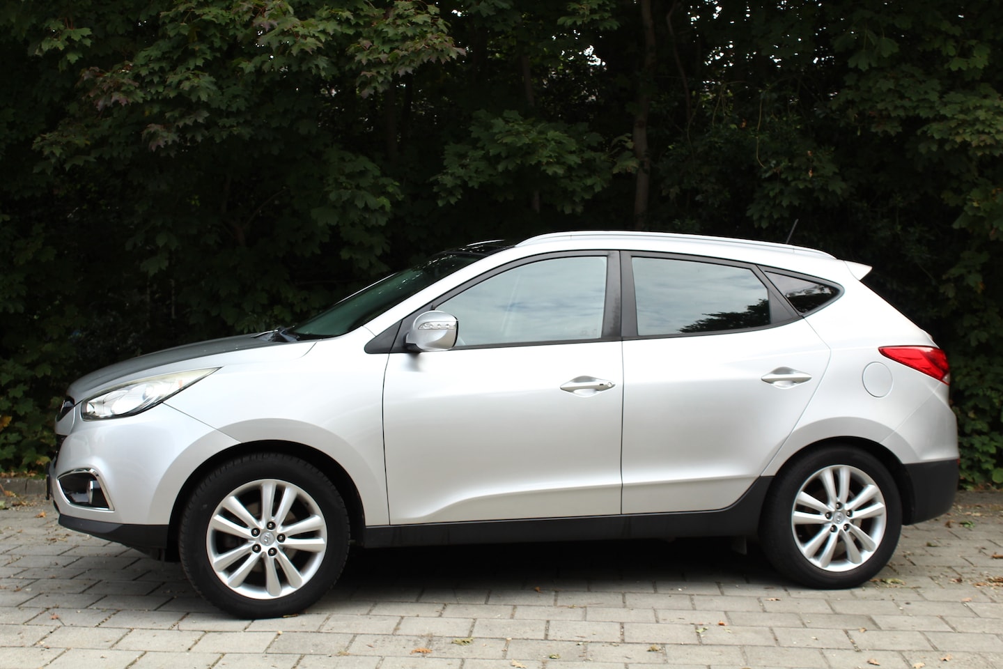 Hyundai ix35 - 2.0i i-Catcher clima cruise navigatie trekhaak glazen dak enz. - AutoWereld.nl