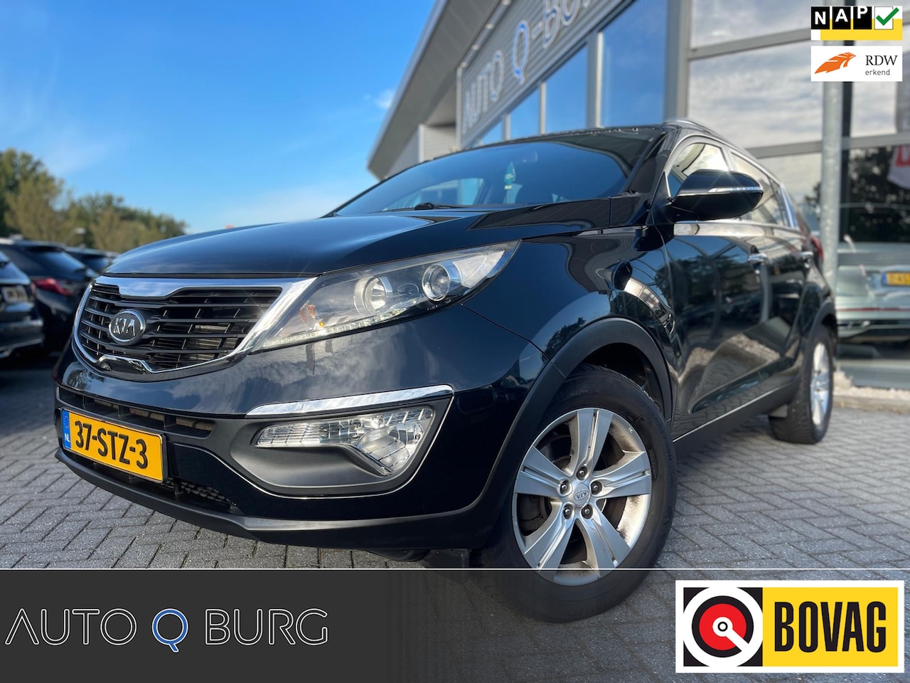 Kia Sportage - 2.0 X-ecutive Plus Pack | Automaat | Trekhaak | Cruise | Camera | PDC | Navi | Climate | - AutoWereld.nl