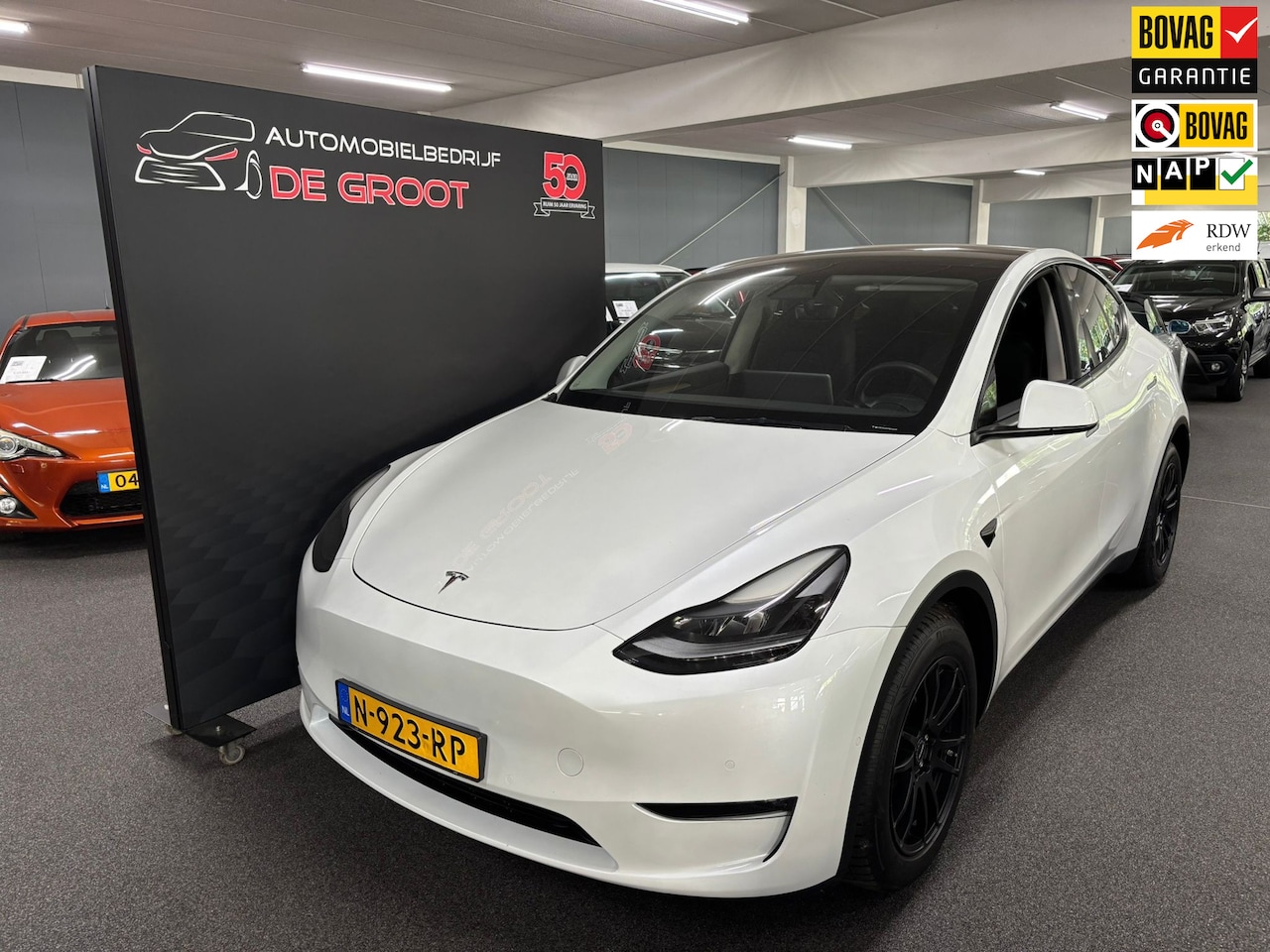 Tesla Model Y - Long Range AWD 75 kWh/ NAP/81.600 KM/ Apple Carplay - AutoWereld.nl