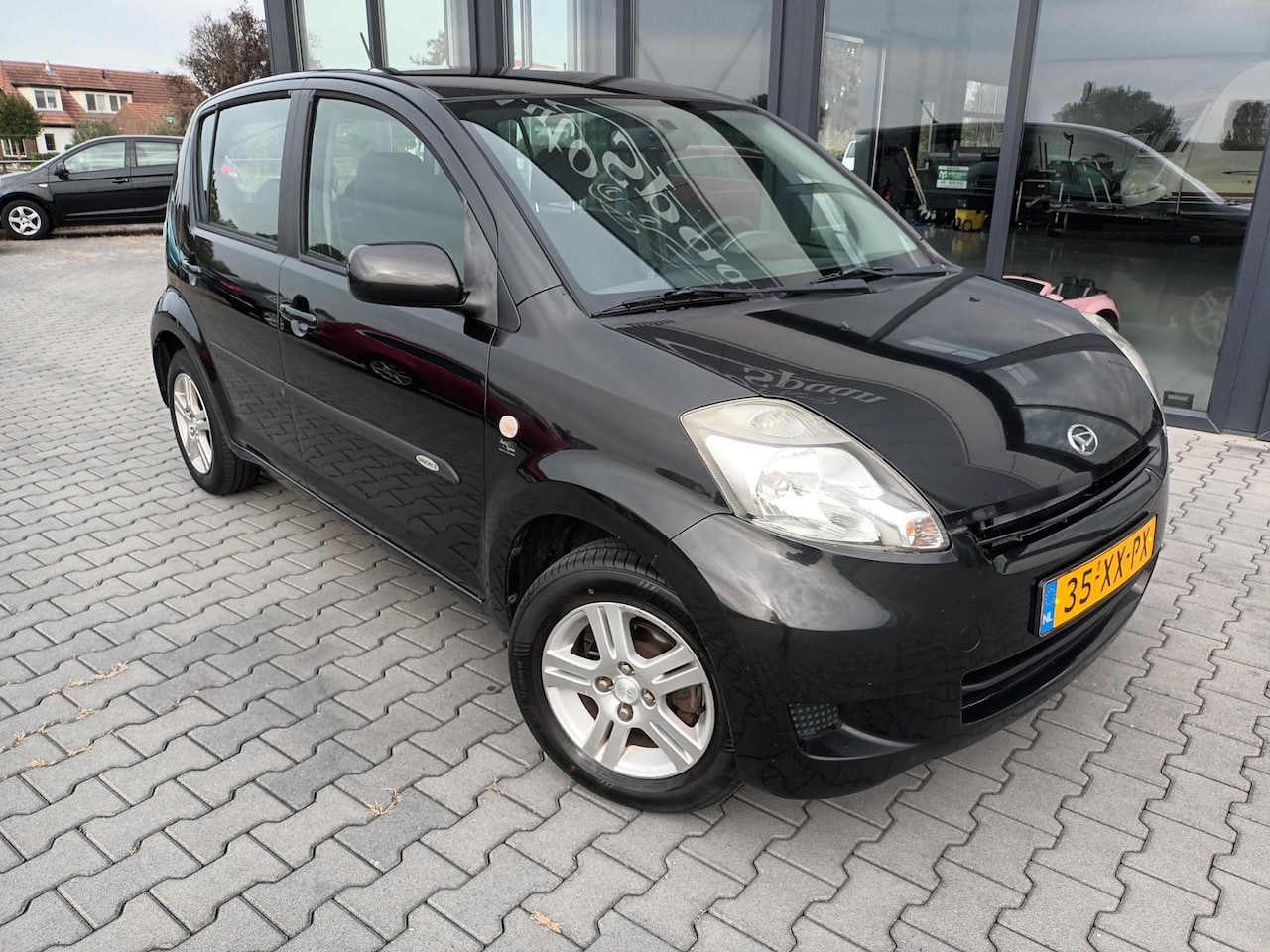 Daihatsu Sirion 2 - 1.3-16V Prestige airco - AutoWereld.nl
