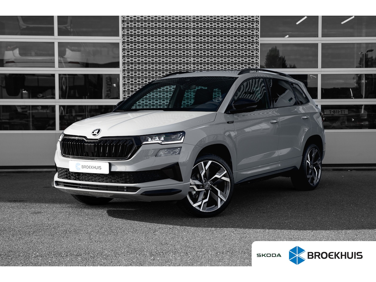 Skoda Karoq - 1.5TSI 150 pk DSG Sportline Business Trekhaak | 19" | Achteruitrijcamera | Cruise Control - AutoWereld.nl