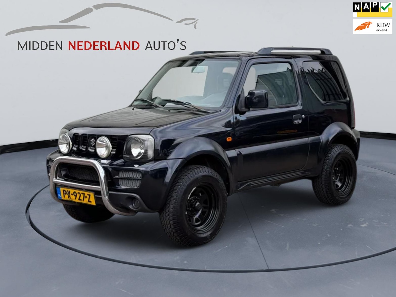 Suzuki Jimny - 1.3 JLX * VERHOOGD * APK 2026 * TREKHAAK * AIRCO * 4X4 * - AutoWereld.nl